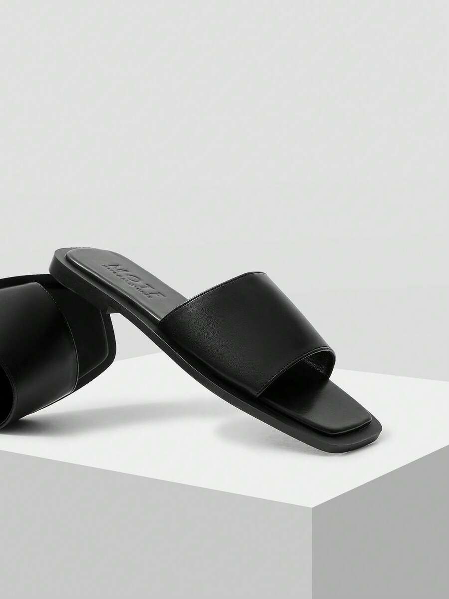 Retro women's square toe open toe flat slippers featuring a smooth PU leather finish and lightweight slip-on design.