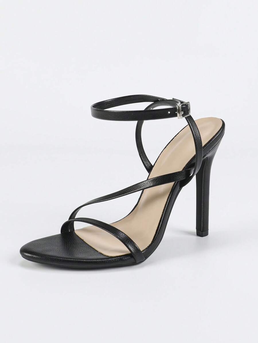 Glossy high heel sandals with open round toe, stiletto heel, and cross ankle buckle strap