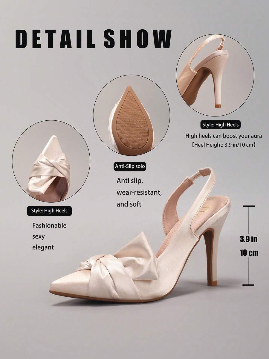 Lace embroidered high heels with thin stiletto heel, pointed toe, rhinestone embellishments, and ankle strap buckle closure.