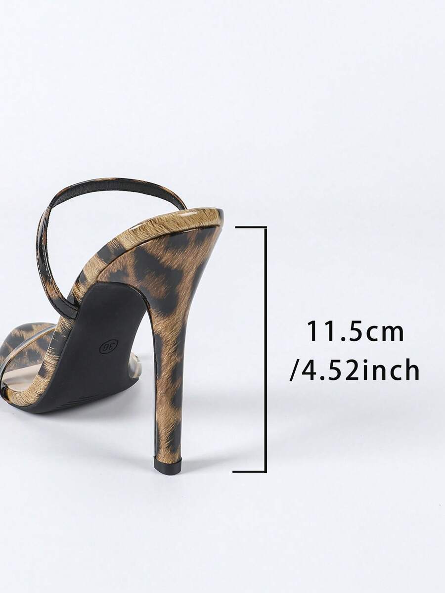 Women's stiletto high heel sandals with round open toe and back ankle strap in solid finish.