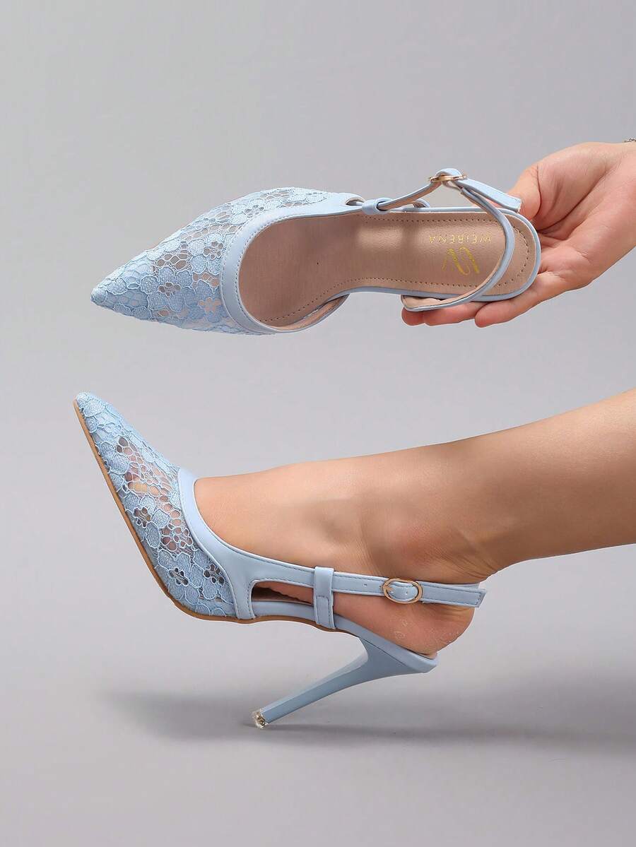 Black lace pointed toe high heel pumps featuring stiletto heels and a decorative bow accent.