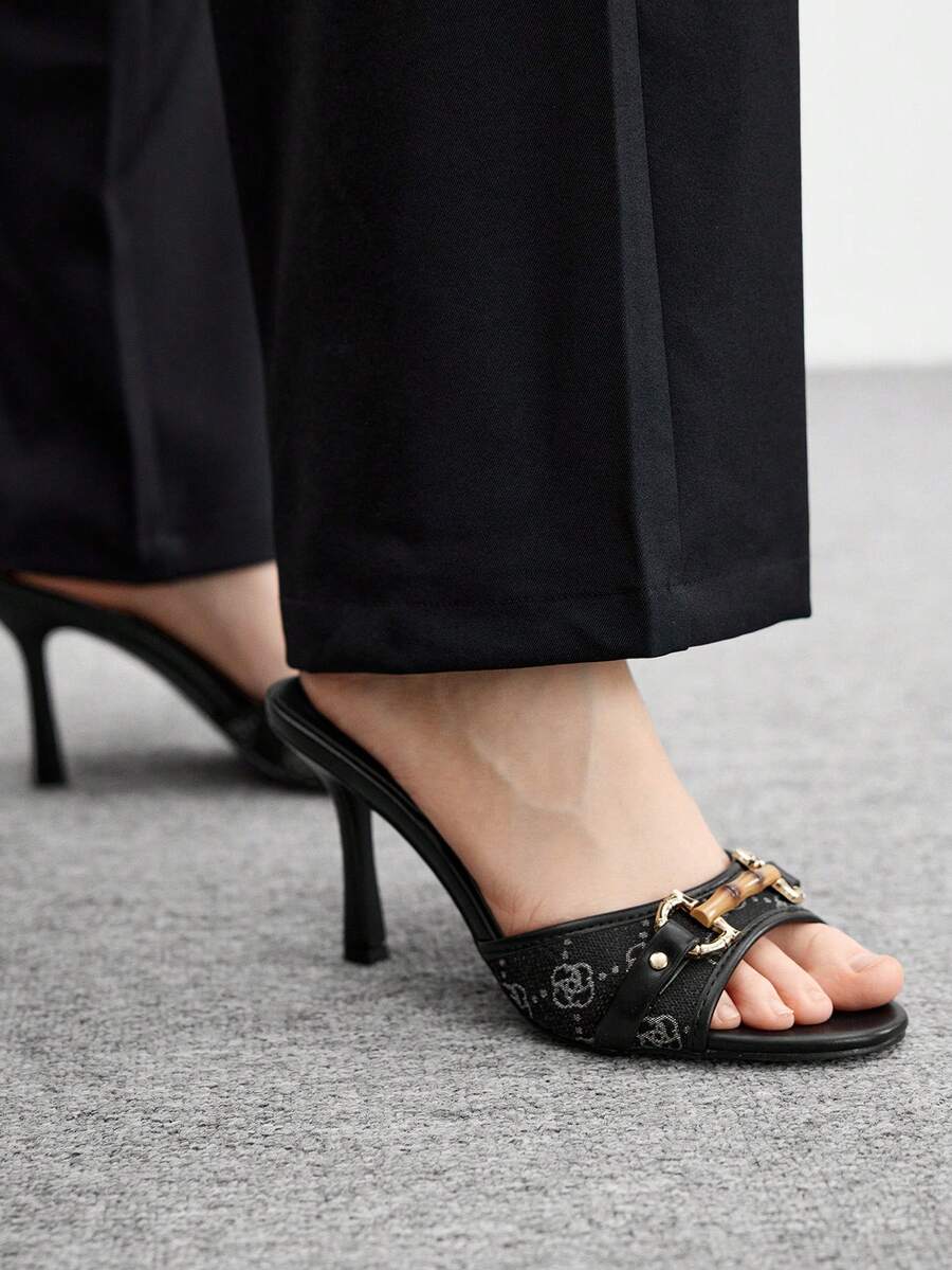 Beige pointed toe mule high heel sandals featuring gold buckle accent