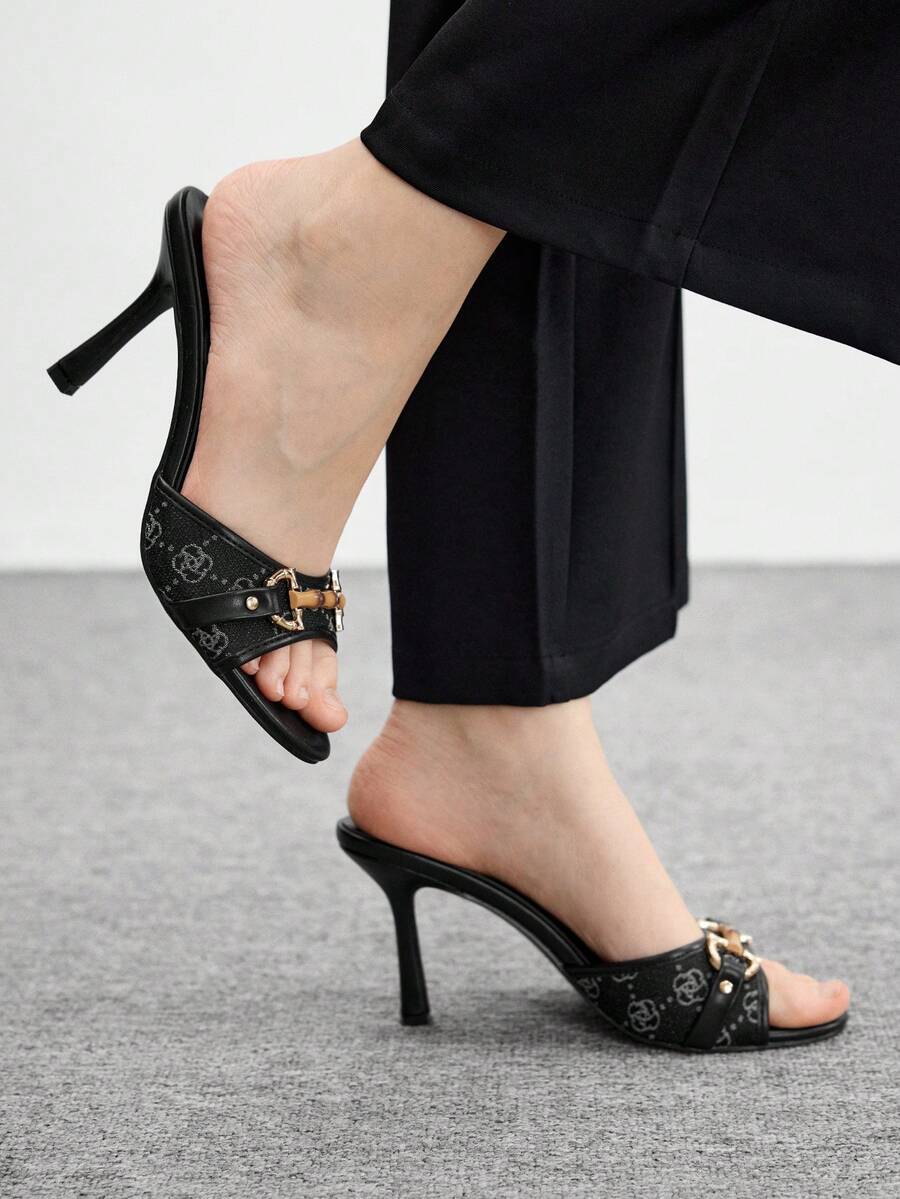 Beige pointed toe mule high heel sandals featuring gold buckle accent