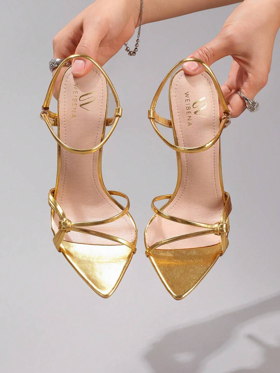 Lace stiletto high heel sandals with pointed open toe, ankle strap buckle, and bow detail