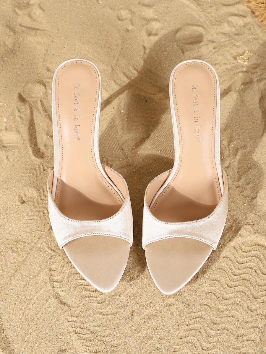 Women's open toe slip-on high heel sandals featuring a smooth satin strap and elegant stiletto mid heel.