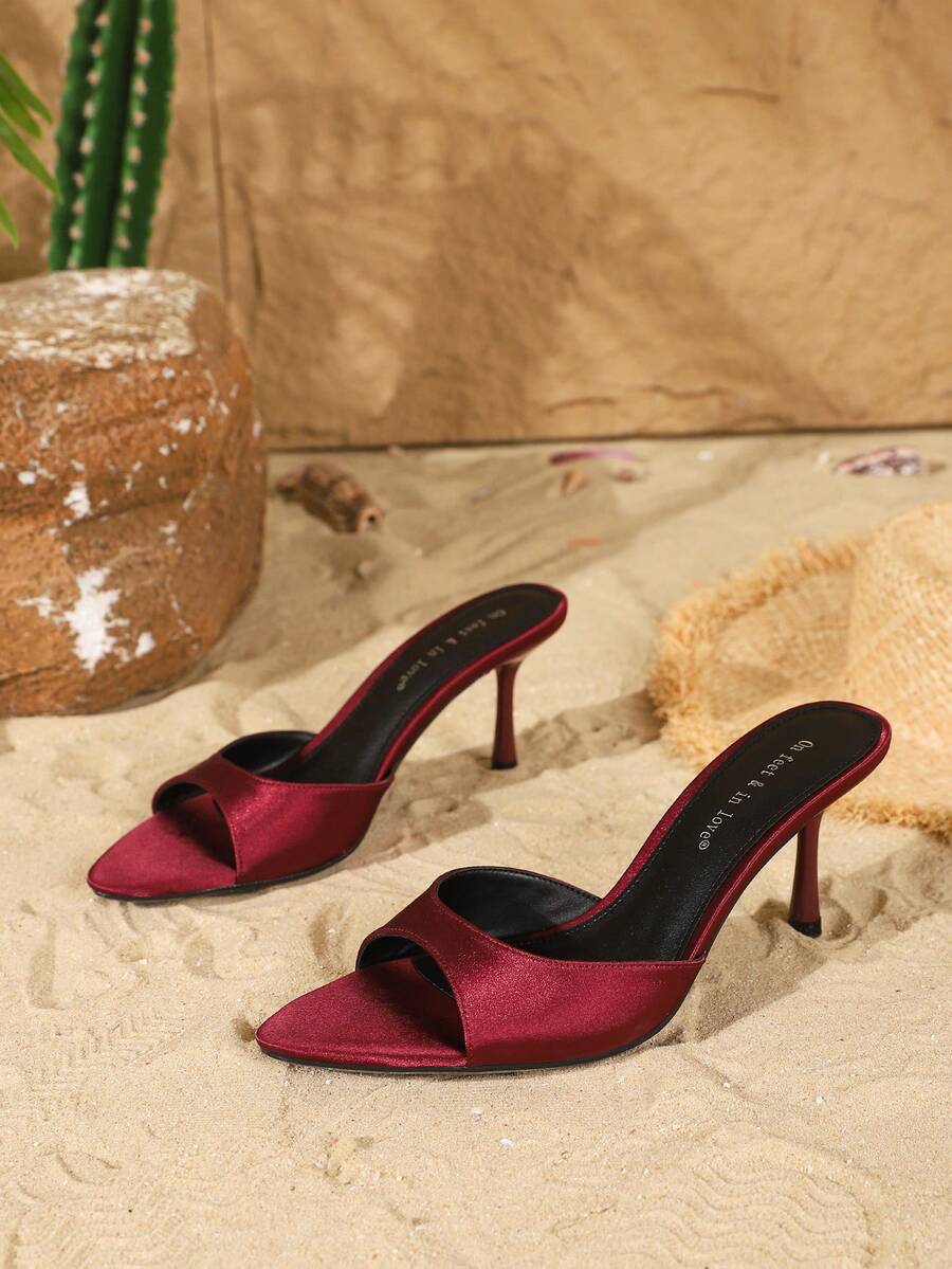 Women's open toe slip-on high heel sandals featuring a smooth satin strap and elegant stiletto mid heel.