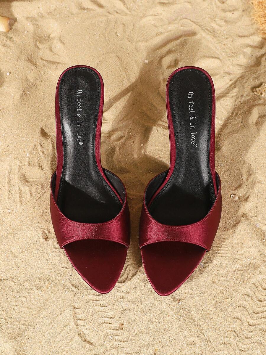 Women's open toe slip-on high heel sandals featuring a smooth satin strap and elegant stiletto mid heel.