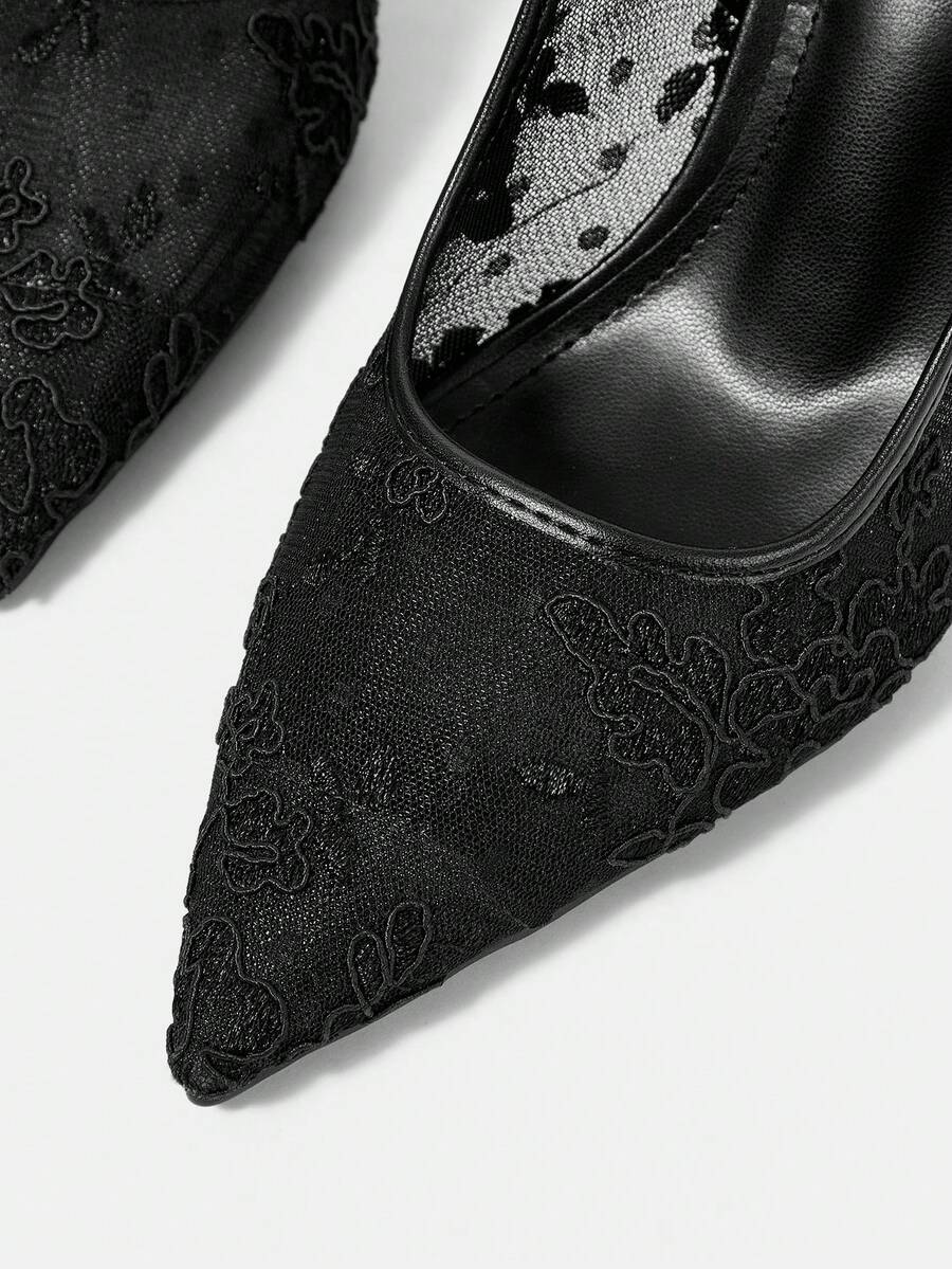 High heel wedding slingback pumps featuring delicate lace mesh upper, pointed toe, buckle strap, and stiletto heel