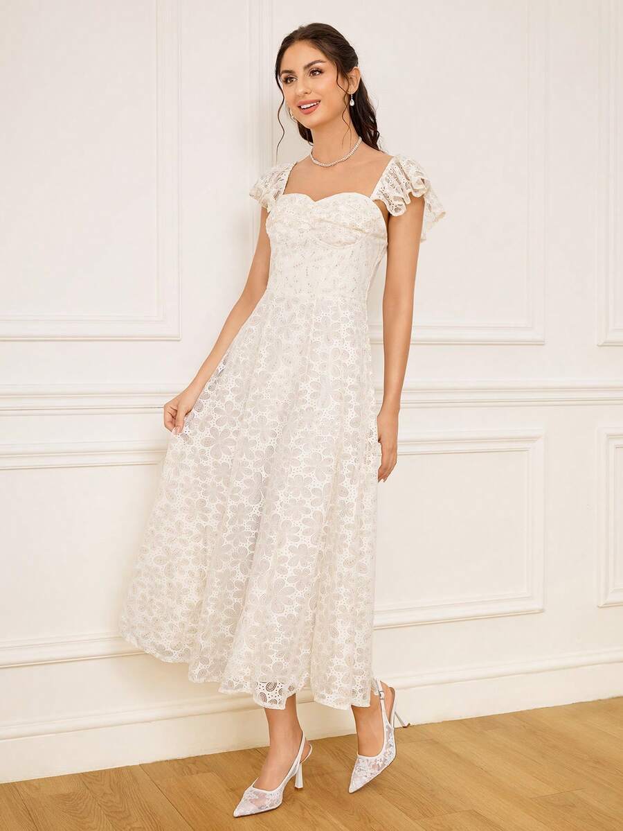 High heel wedding slingback pumps featuring delicate lace mesh upper, pointed toe, buckle strap, and stiletto heel