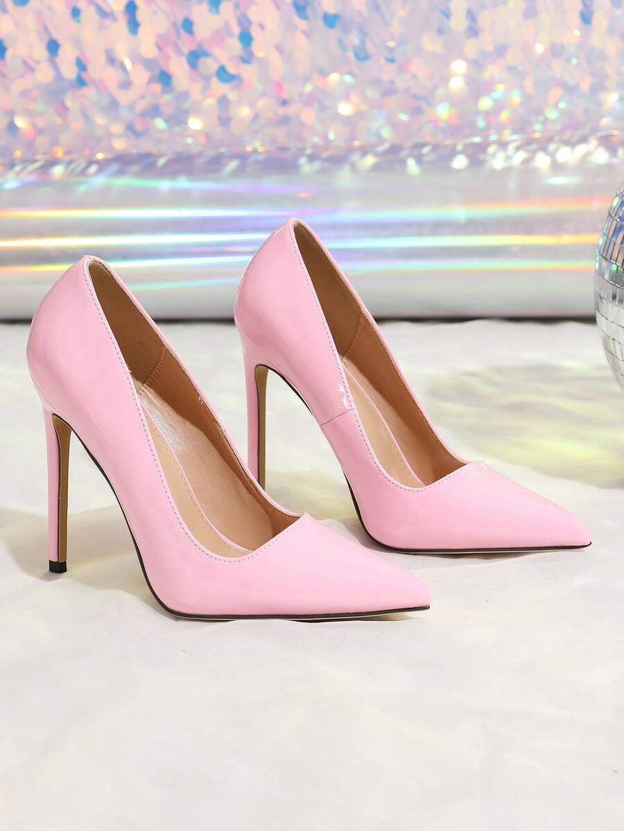 Women's pointed toe stiletto high heel pumps featuring a lace bow accent and slingback buckle strap.
