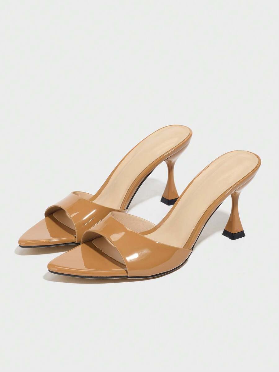 Women's pointed toe high heel mule sandals featuring a sleek slip-on design with elegant lace embroidery detailing