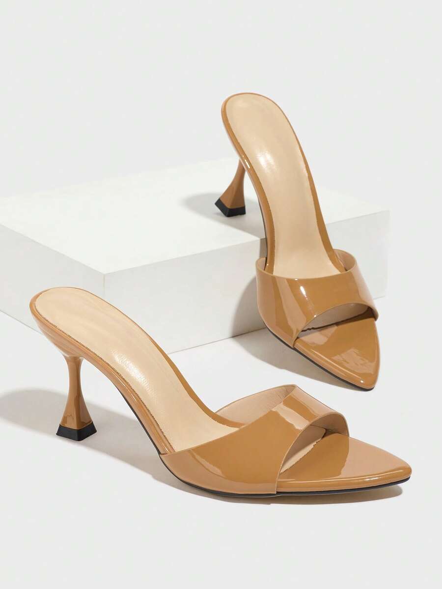 Women's pointed toe high heel mule sandals featuring a sleek slip-on design with elegant lace embroidery detailing