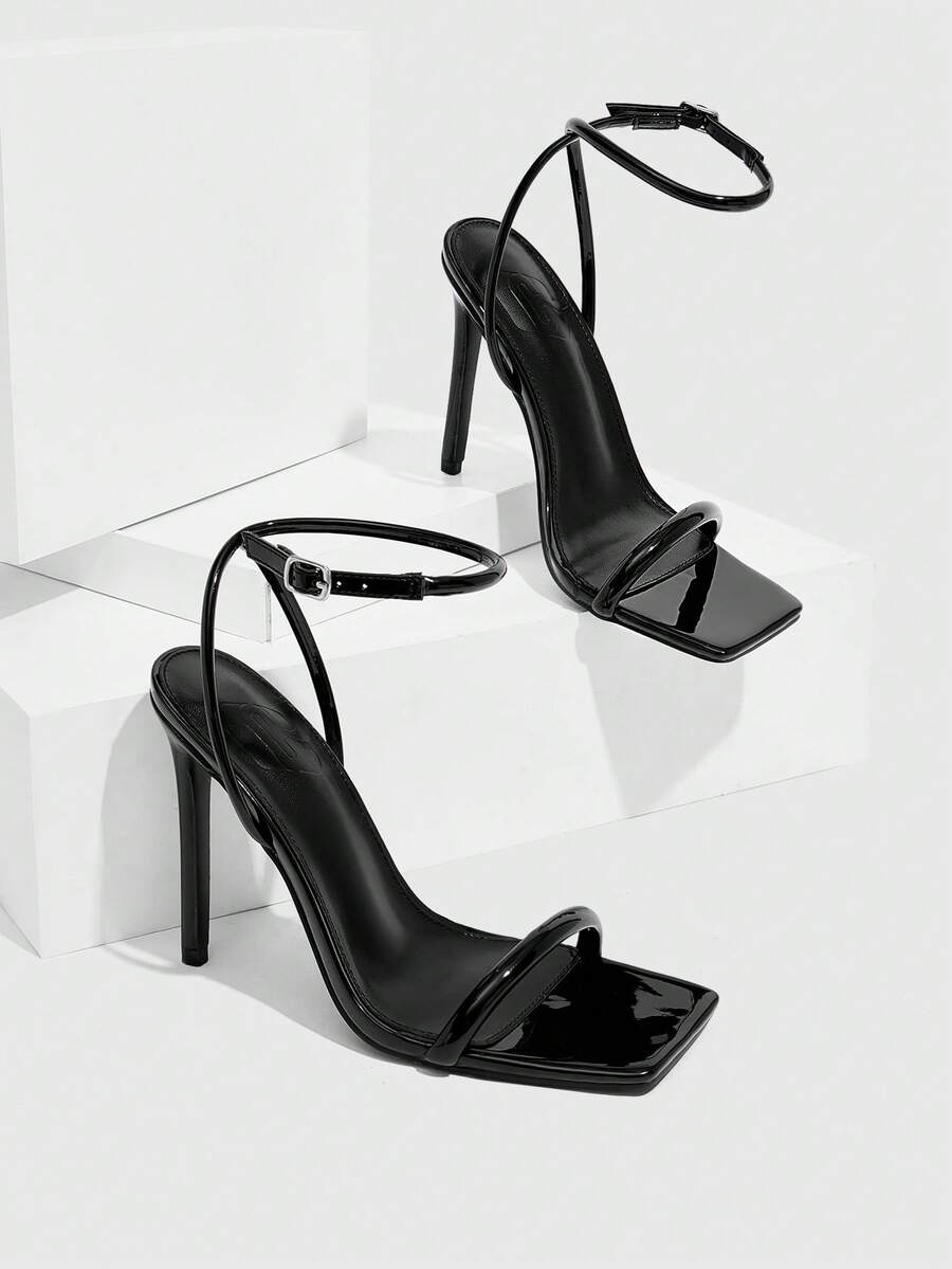 Women's open toe high heel slingback sandals featuring a sleek stiletto heel and adjustable ankle strap buckle closure.