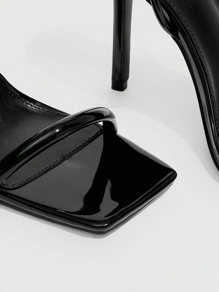 Women's open toe high heel slingback sandals featuring a sleek stiletto heel and adjustable ankle strap buckle closure.