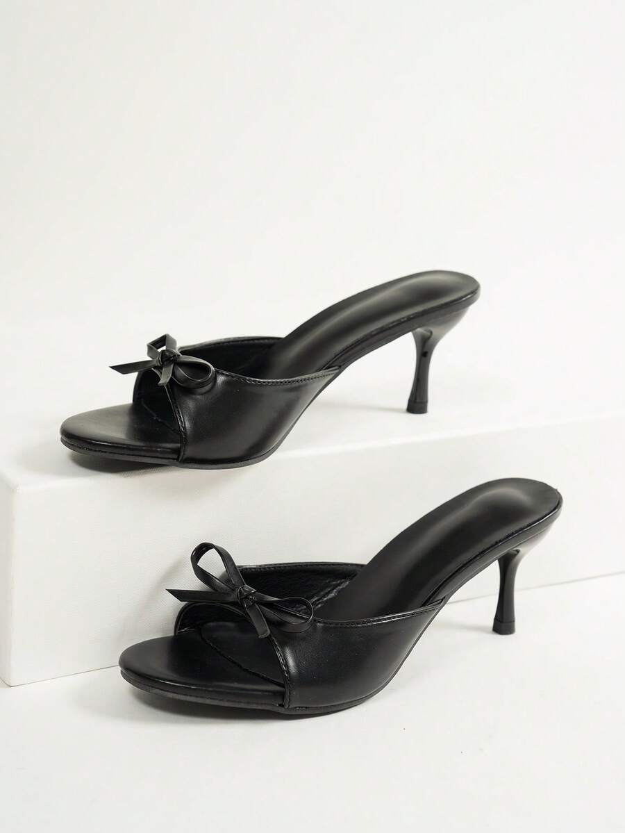 Women's elegant peep toe platform heel sandals featuring a decorative front bow knot in a solid color design.