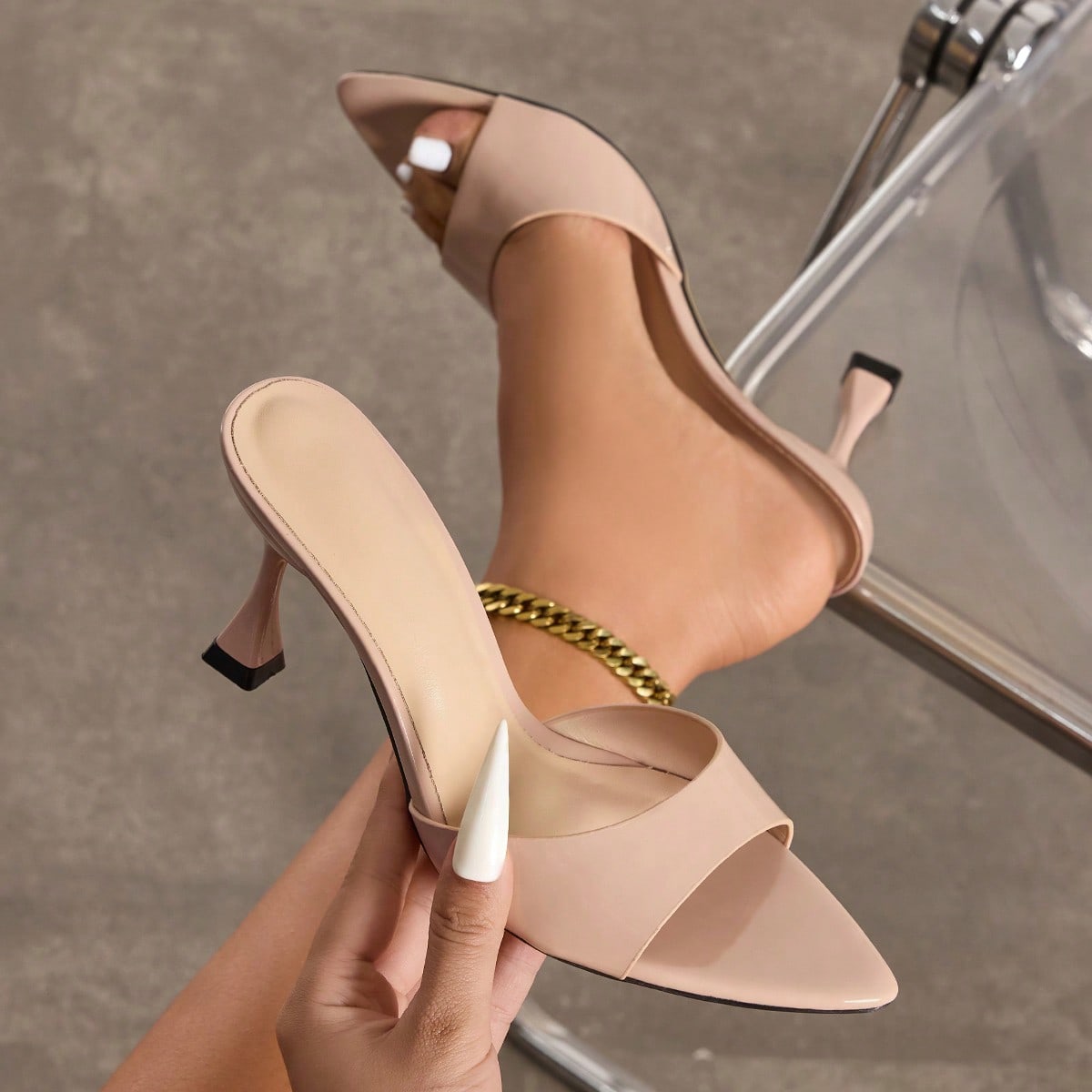 Women's pointed toe high heel mule sandals featuring a sleek slip-on design with elegant lace embroidery detailing