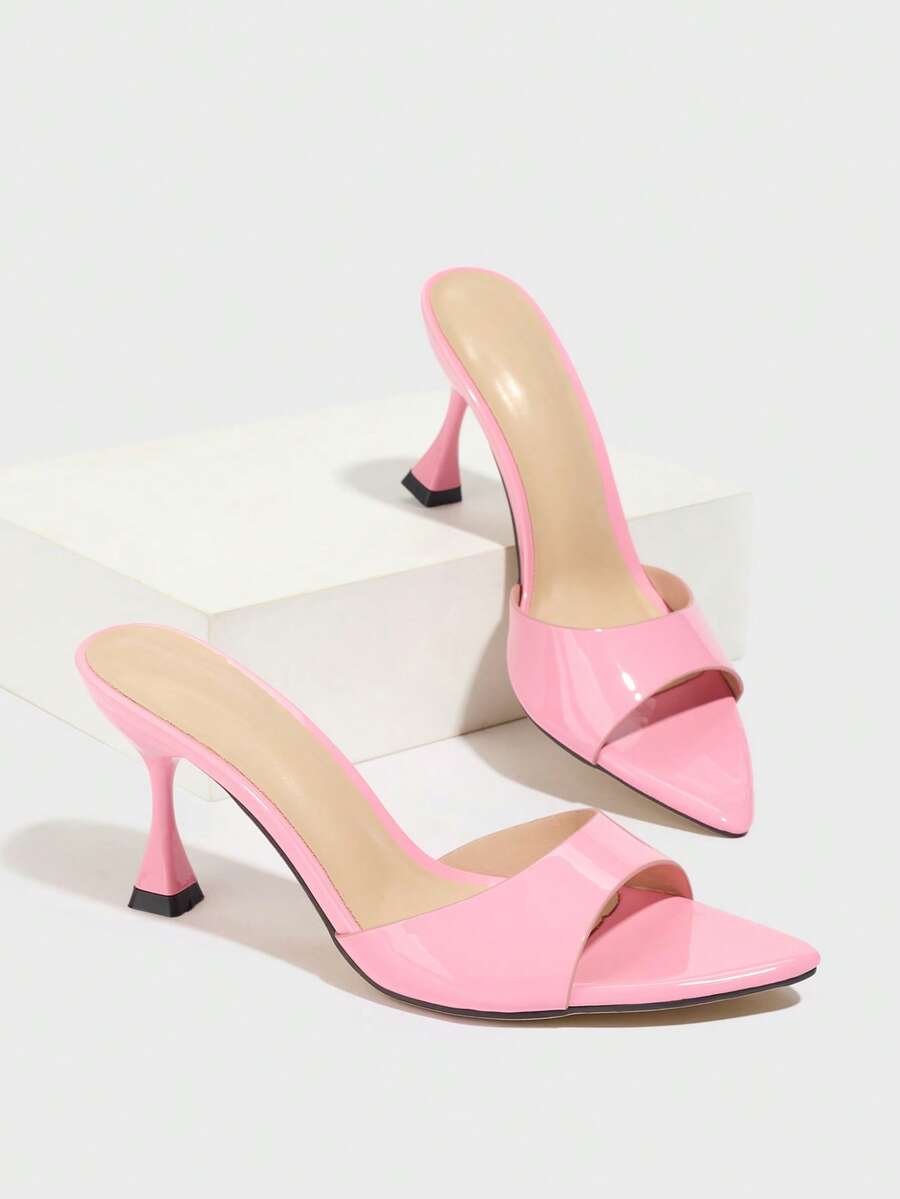 Women's pointed toe high heel mule sandals featuring a sleek slip-on design with elegant lace embroidery detailing
