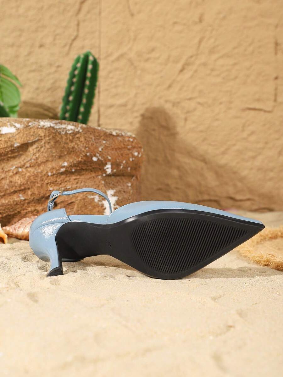 Elegant pointy-toe stiletto high heel pumps with hollow out sides and buckle ankle strap for weddings and evening dresses.