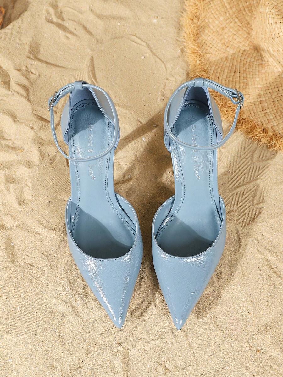 Elegant pointy-toe stiletto high heel pumps with hollow out sides and buckle ankle strap for weddings and evening dresses.