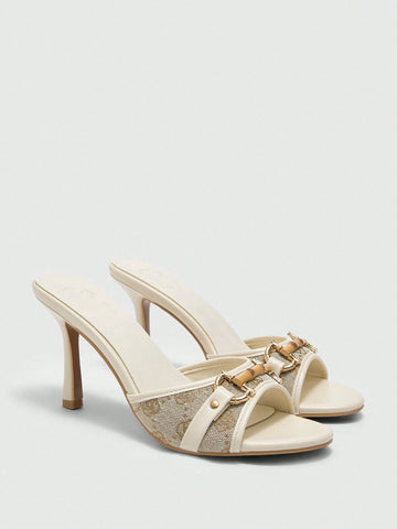 Beige pointed toe mule high heel sandals featuring gold buckle accent