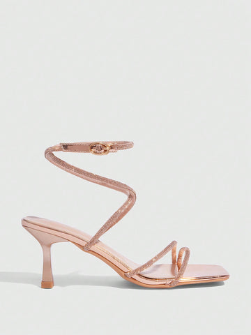 Square toe kitten heel sandals with sparkling rhinestone strap in light gold PU leather