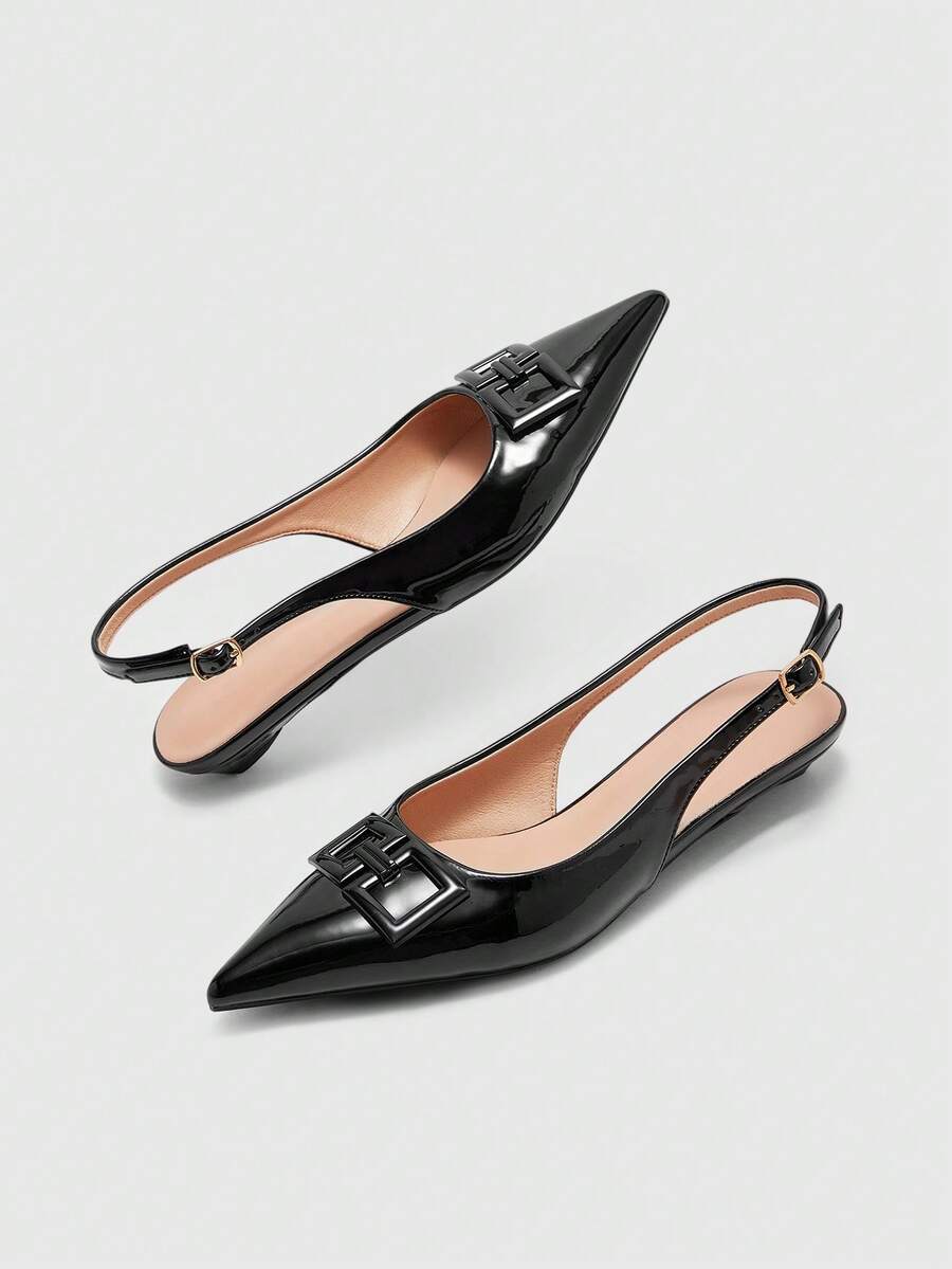 Women's pointed toe low wedge flat shoes crafted in PU leather with a slingback strap and stylish metal buckle detail.