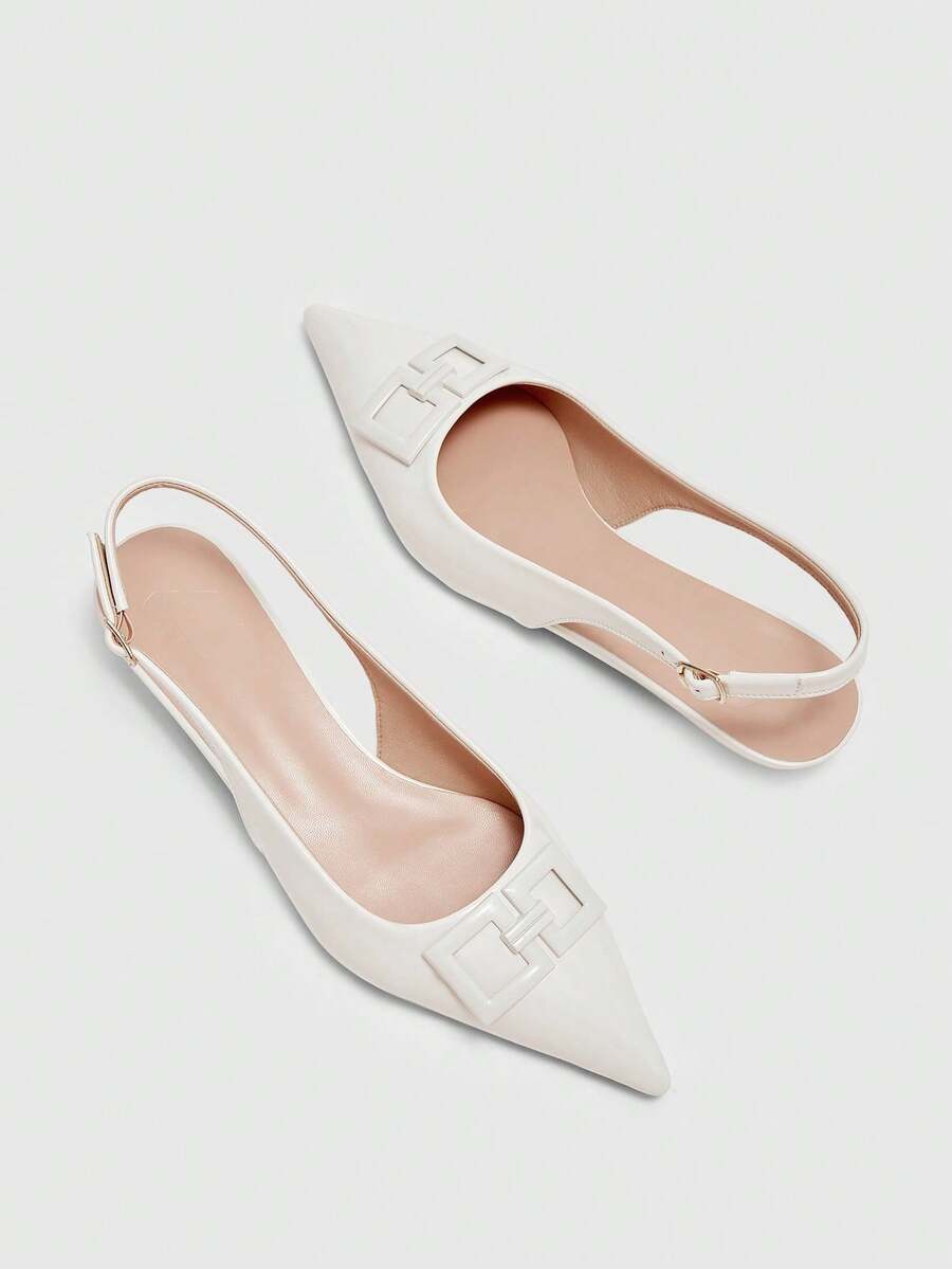 Women's pointed toe low wedge flat shoes crafted in PU leather with a slingback strap and stylish metal buckle detail.