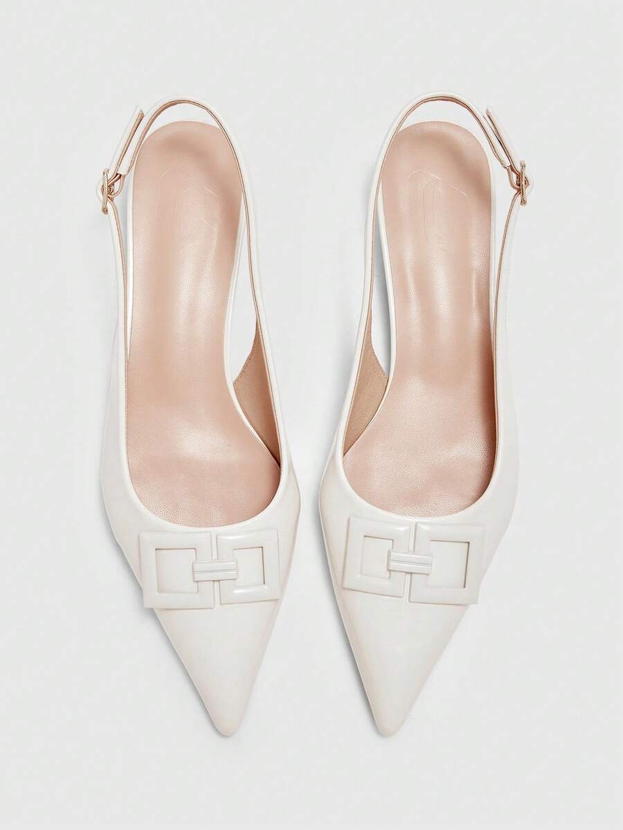 Women's pointed toe low wedge flat shoes crafted in PU leather with a slingback strap and stylish metal buckle detail.