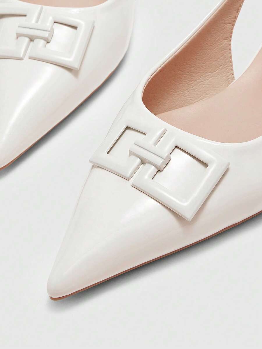 Women's pointed toe low wedge flat shoes crafted in PU leather with a slingback strap and stylish metal buckle detail.