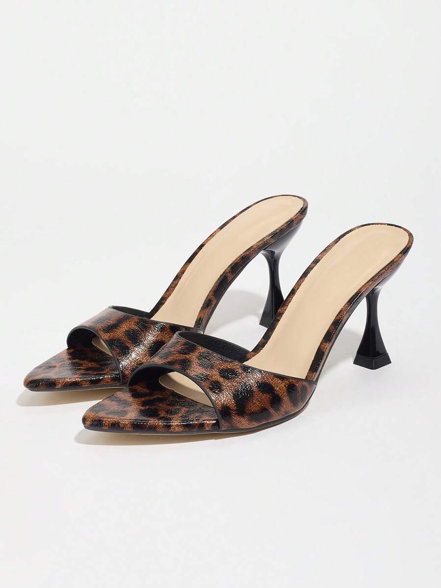 Women's pointed toe high heel mule sandals featuring a sleek slip-on design with elegant lace embroidery detailing