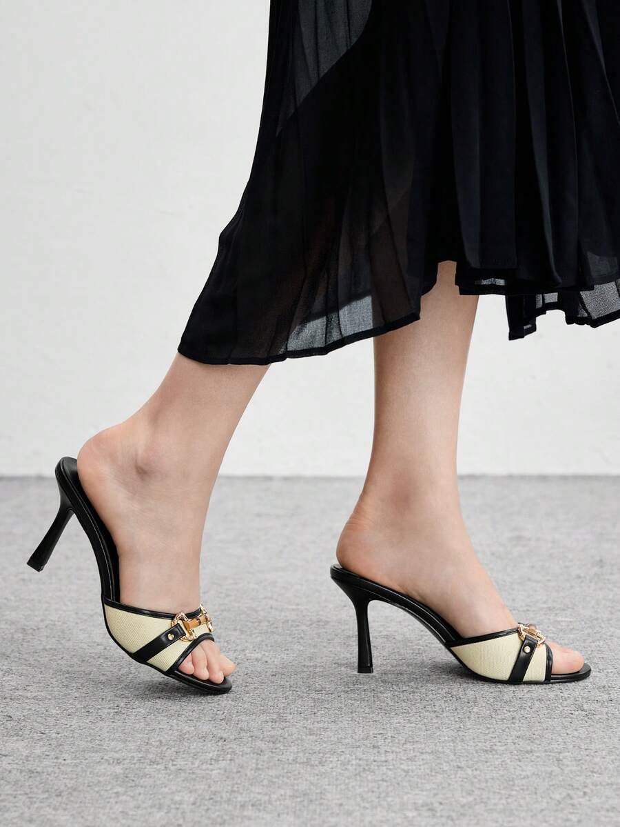 Women's open toe high heel slingback sandals featuring metal bamboo joint accent and stiletto heels.