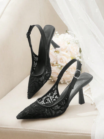 Pointed toe stiletto high heel pumps featuring black lace mesh upper, buckle slingback detail, and sleek slip-on design for weddings and evening wear.