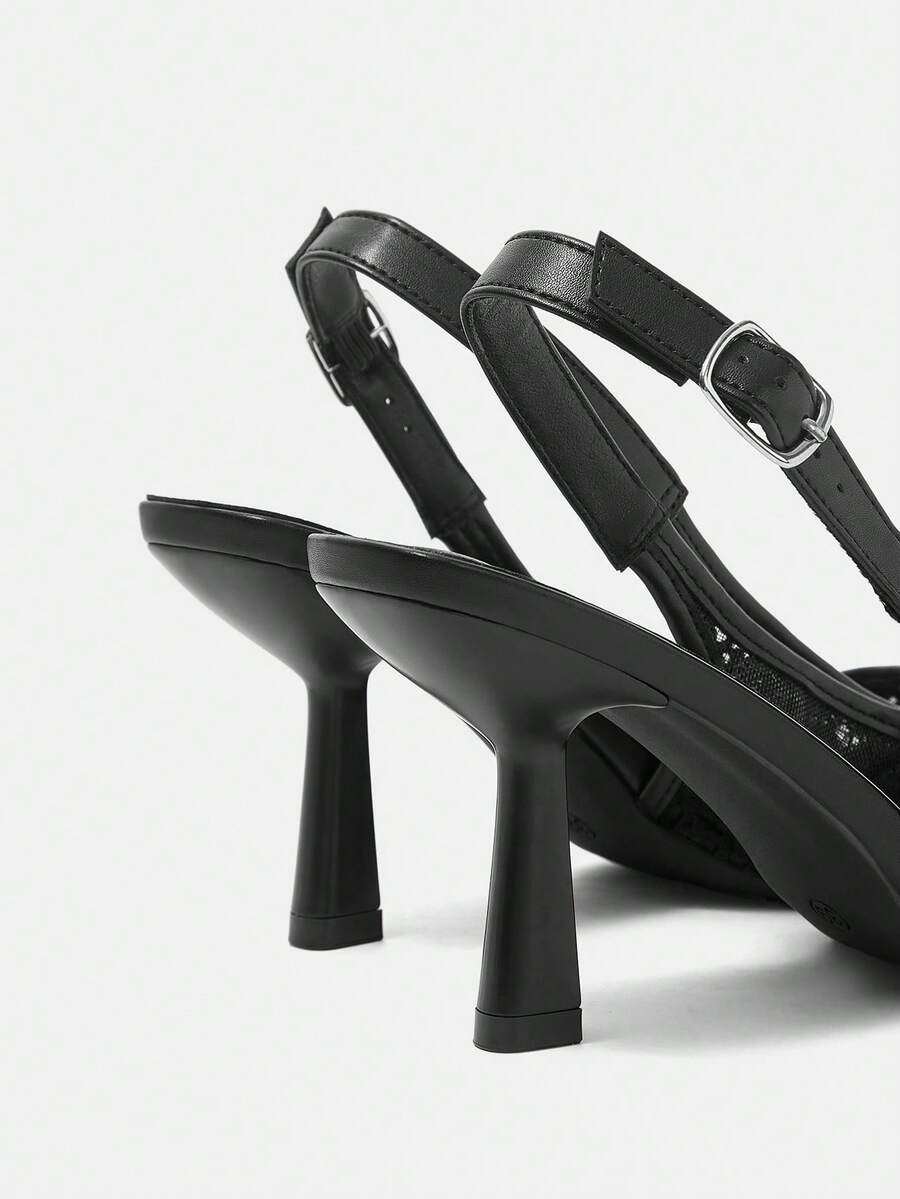 Pointed toe stiletto high heel pumps featuring black lace mesh upper, buckle slingback detail, and sleek slip-on design for weddings and evening wear.