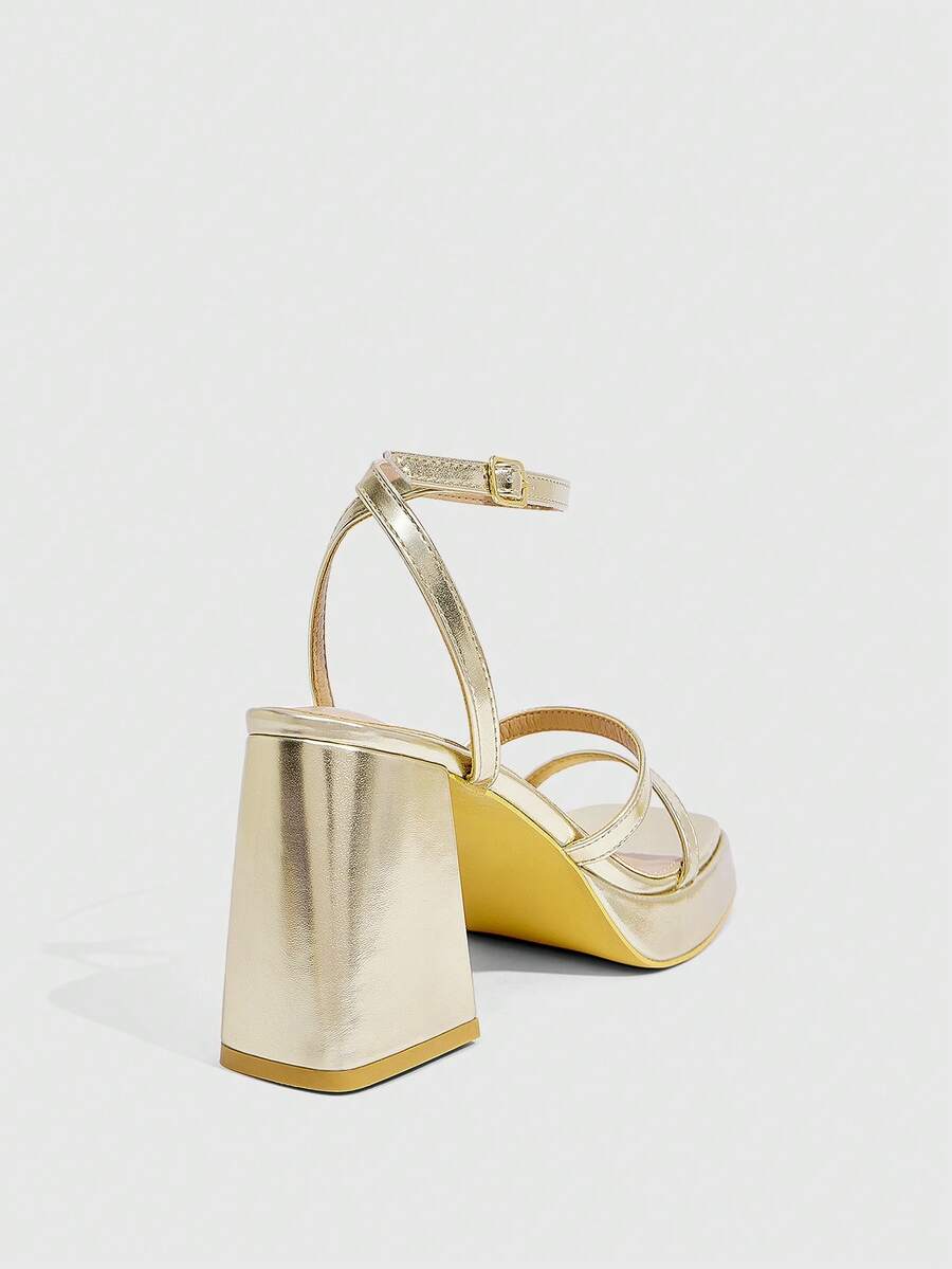 Women's high-heeled sandals with textured pattern, open toe design, chunky heel, and adjustable ankle buckle strap.
