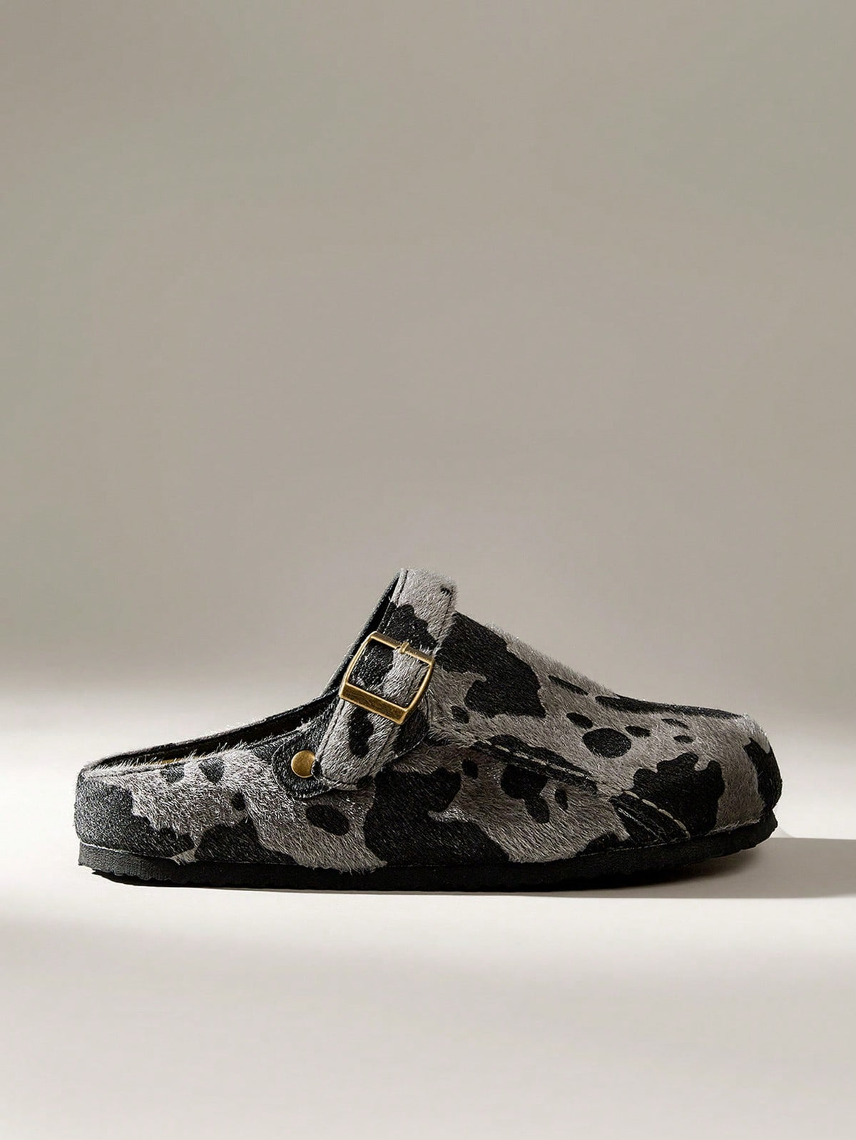 Women's cow pattern flat mules shoes with adjustable buckle strap and flat rubber sole