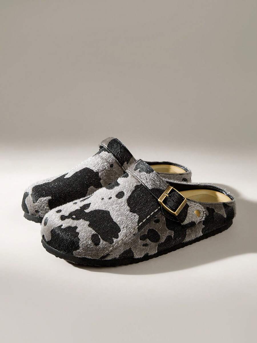 Women's cow pattern flat mules shoes with adjustable buckle strap and flat rubber sole