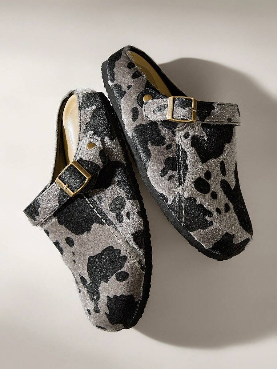 Women's cow pattern flat mules shoes with adjustable buckle strap and flat rubber sole