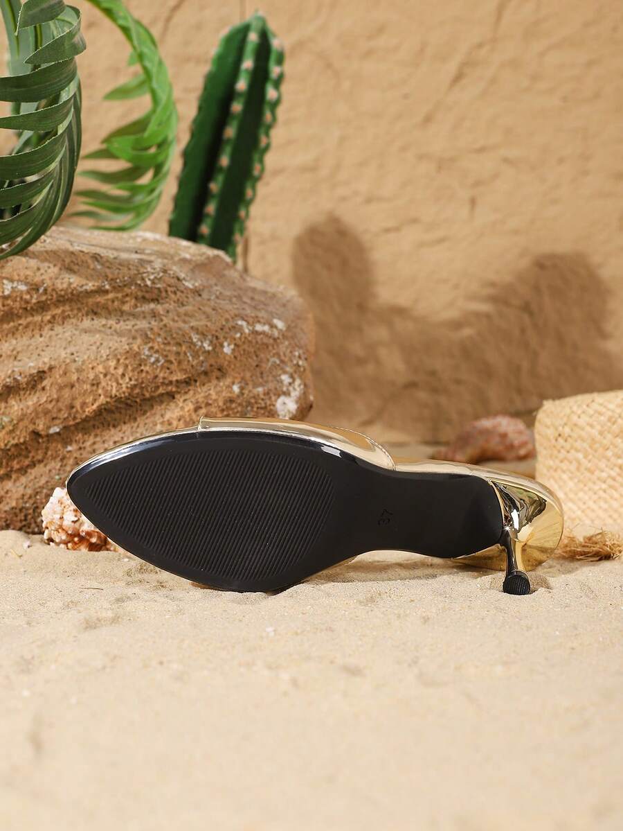 Women's open toe slide sandals featuring sleek patent leather and thin stiletto heels