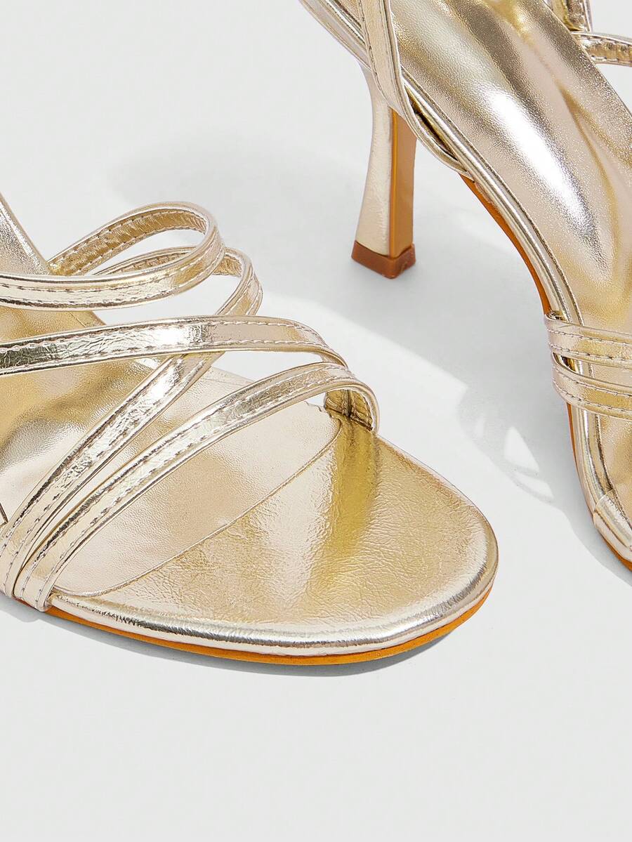 Women's square toe high heel sandals featuring crystal embellishments and crossover ankle straps with buckle closure