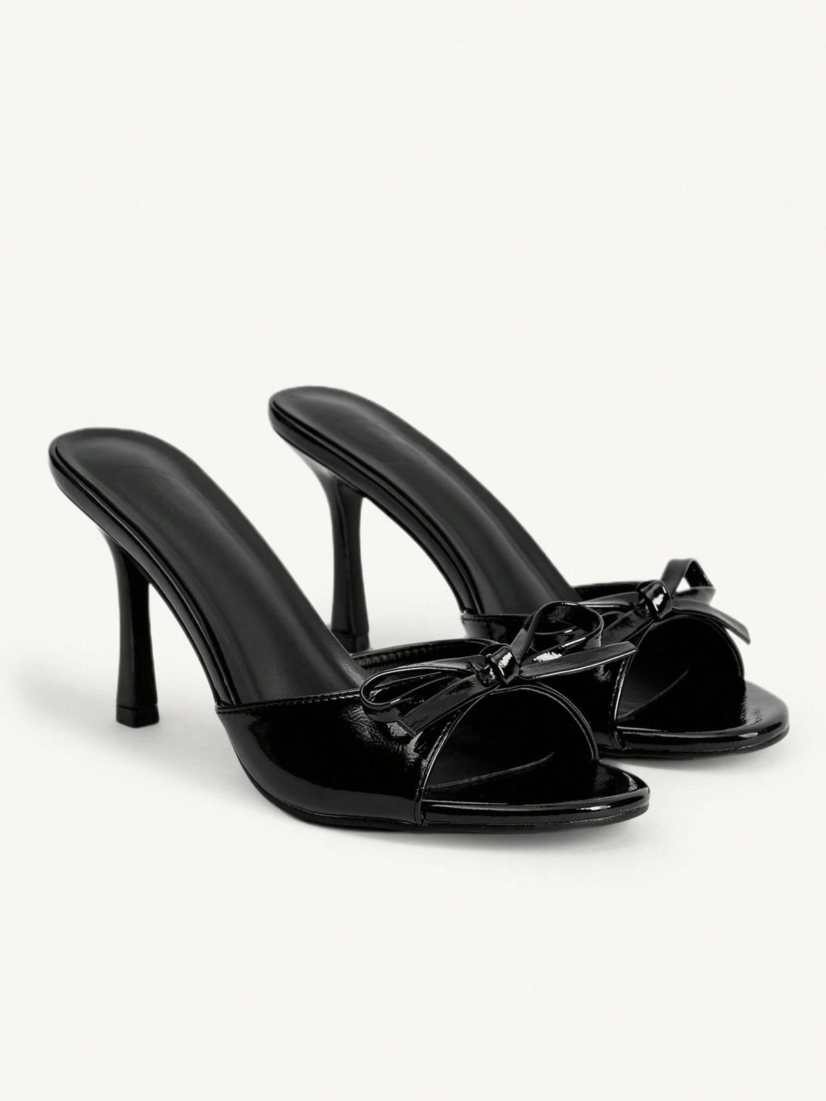 Women's black open-toe stiletto mule high heel sandals with bow detail