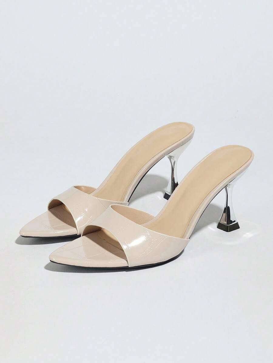 Women's pointed toe high heel mule sandals featuring a sleek slip-on design with elegant lace embroidery detailing