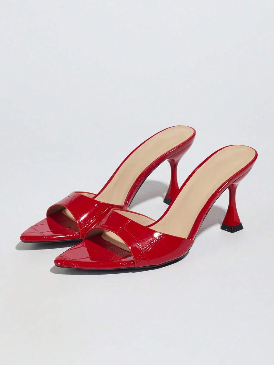 Women's pointed toe high heel mule sandals featuring a sleek slip-on design with elegant lace embroidery detailing