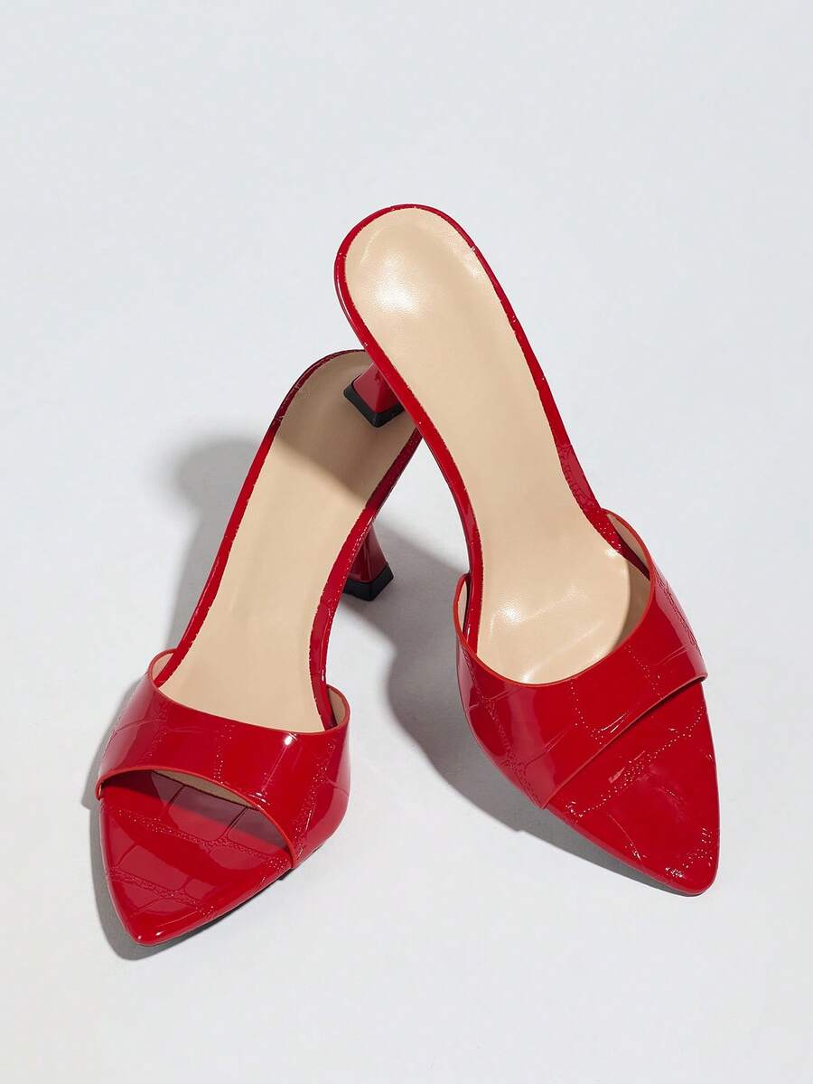 Women's pointed toe high heel mule sandals featuring a sleek slip-on design with elegant lace embroidery detailing