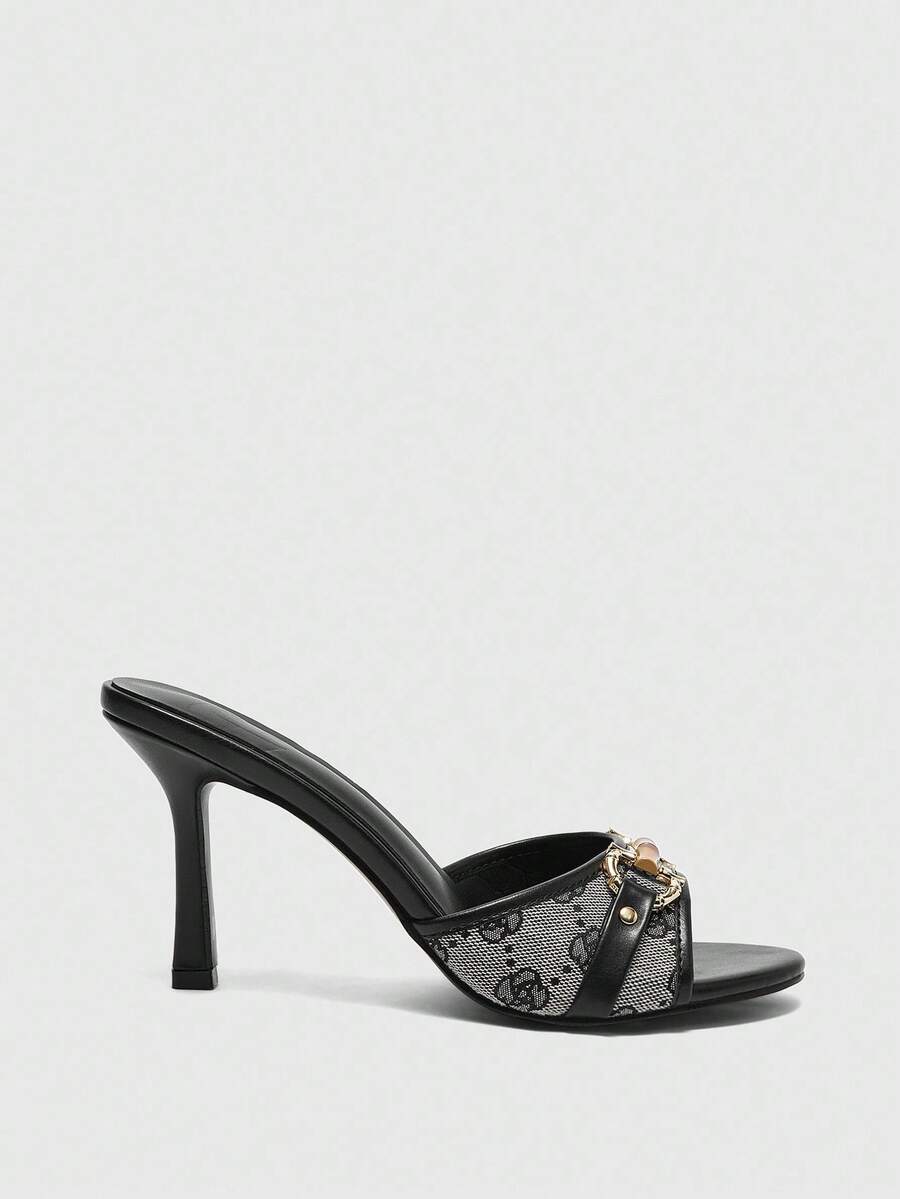 Women's open toe high heel slingback sandals featuring metal bamboo joint accent and stiletto heels.