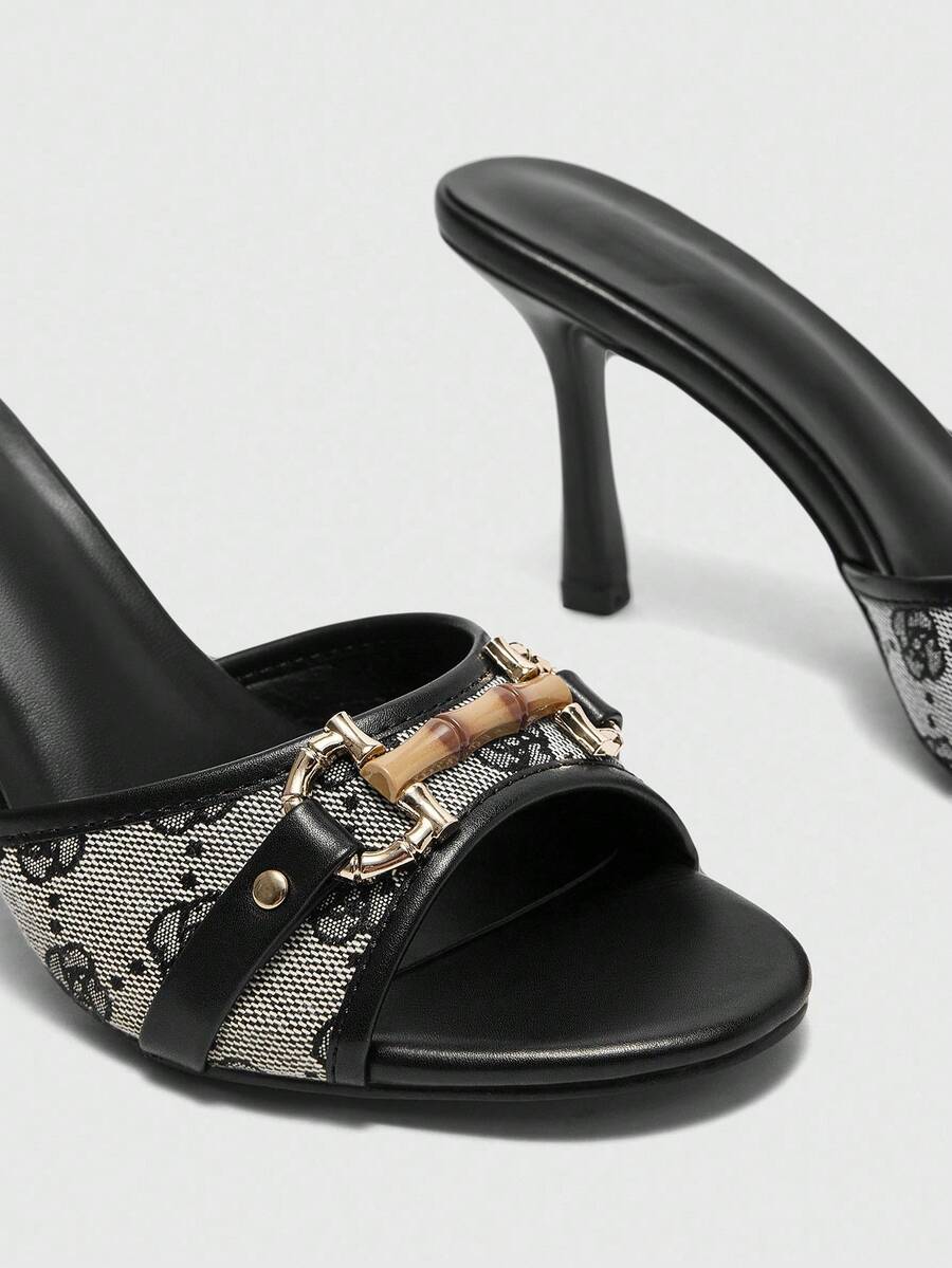 Women's open toe high heel slingback sandals featuring metal bamboo joint accent and stiletto heels.