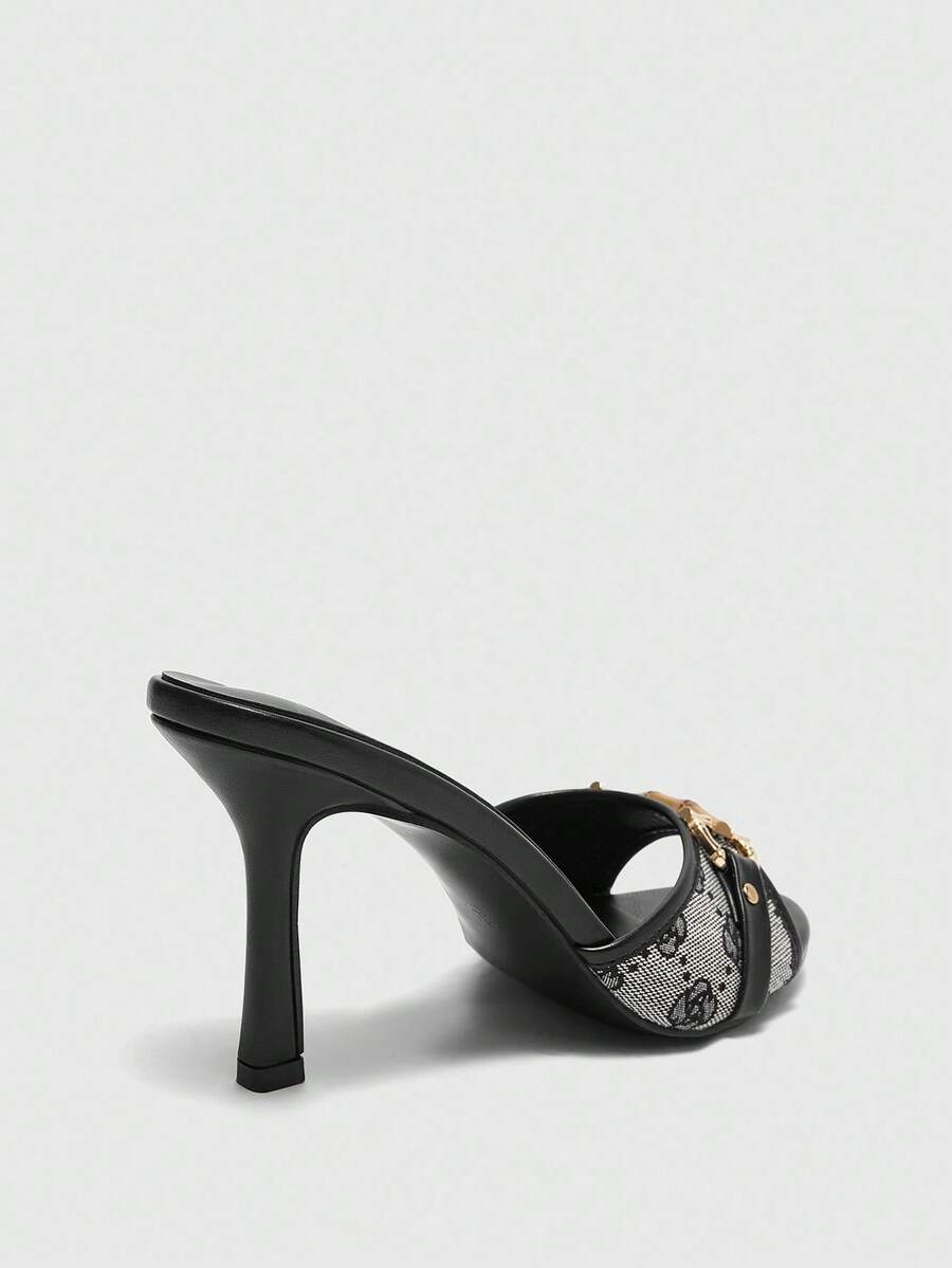 Women's open toe high heel slingback sandals featuring metal bamboo joint accent and stiletto heels.