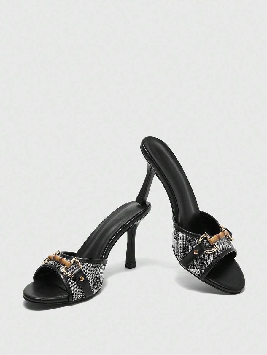 Women's open toe high heel slingback sandals featuring metal bamboo joint accent and stiletto heels.