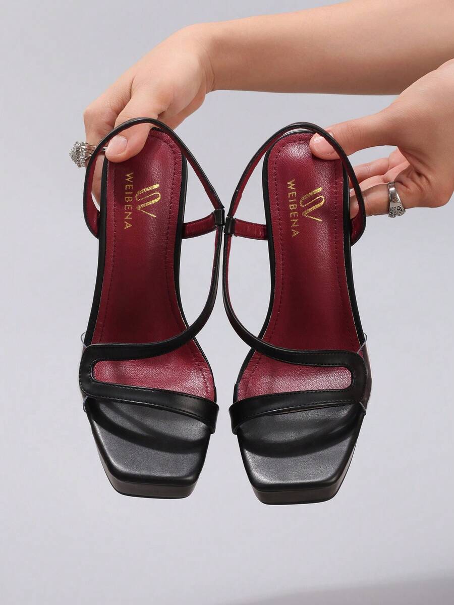 Lace embroidered open toe high heel sandals featuring a chunky square heel, platform wedge, and ankle strap buckle closure.