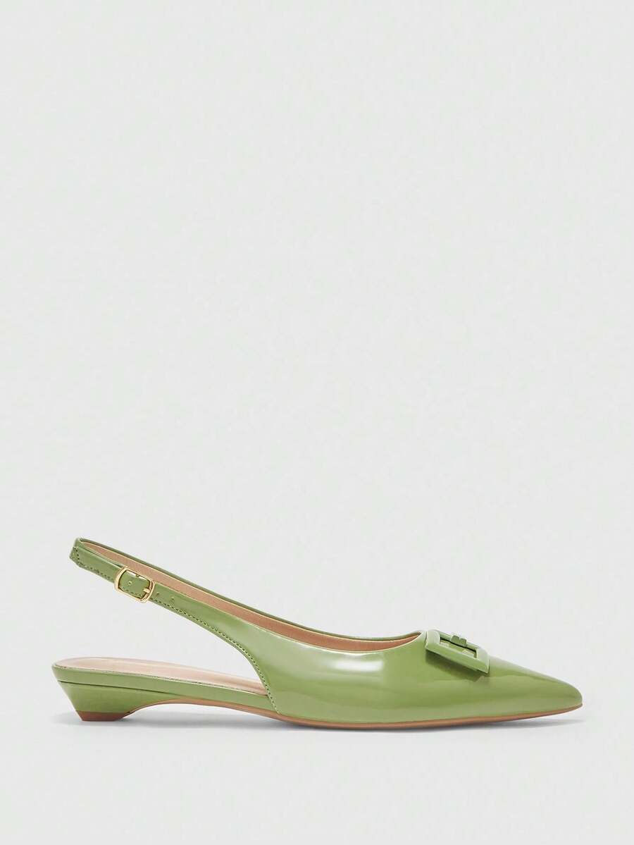 Women's pointed toe low wedge flat shoes crafted in PU leather with a slingback strap and stylish metal buckle detail.