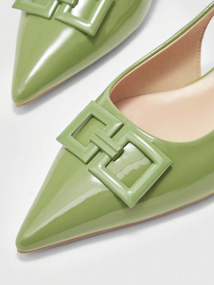 Women's pointed toe low wedge flat shoes crafted in PU leather with a slingback strap and stylish metal buckle detail.